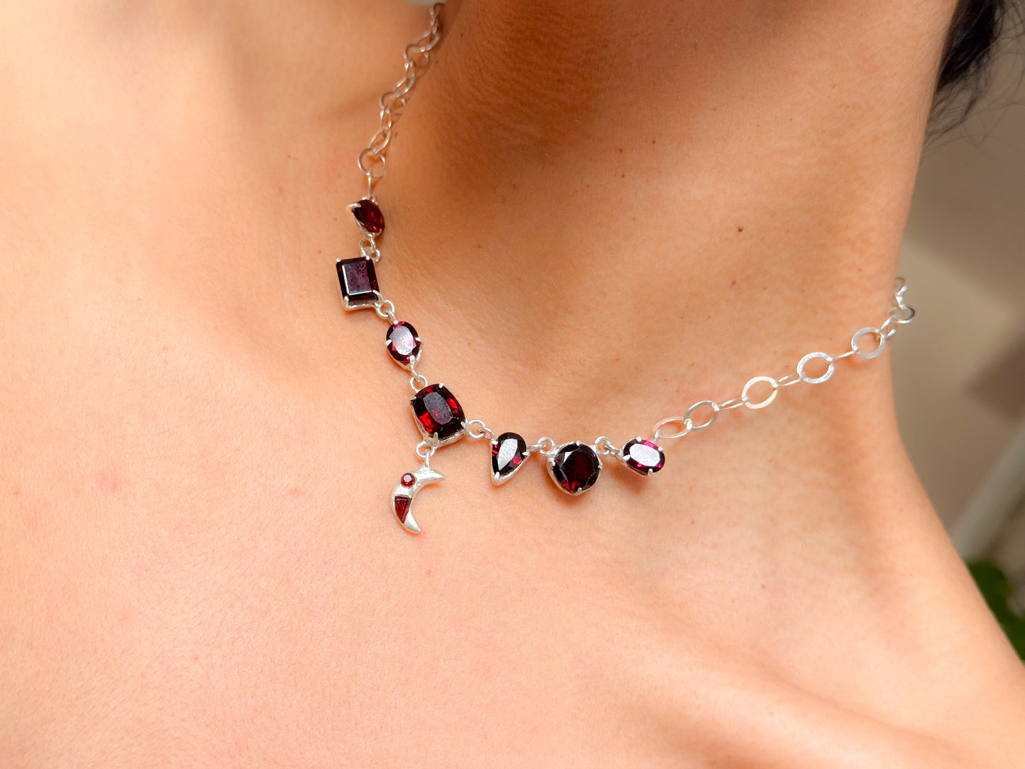 Resurgence. Necklace with garnet