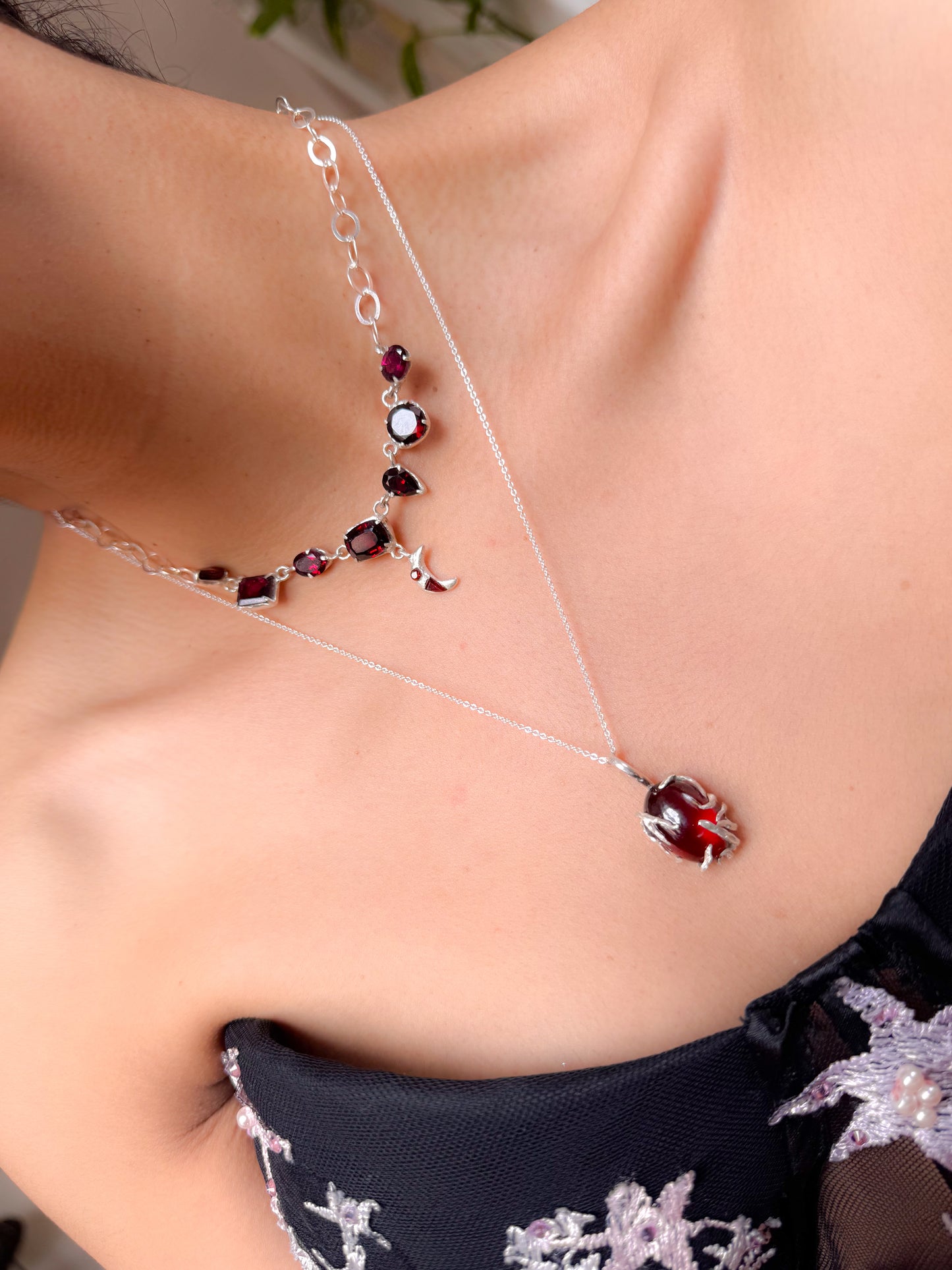 Resurgence. Necklace with garnet