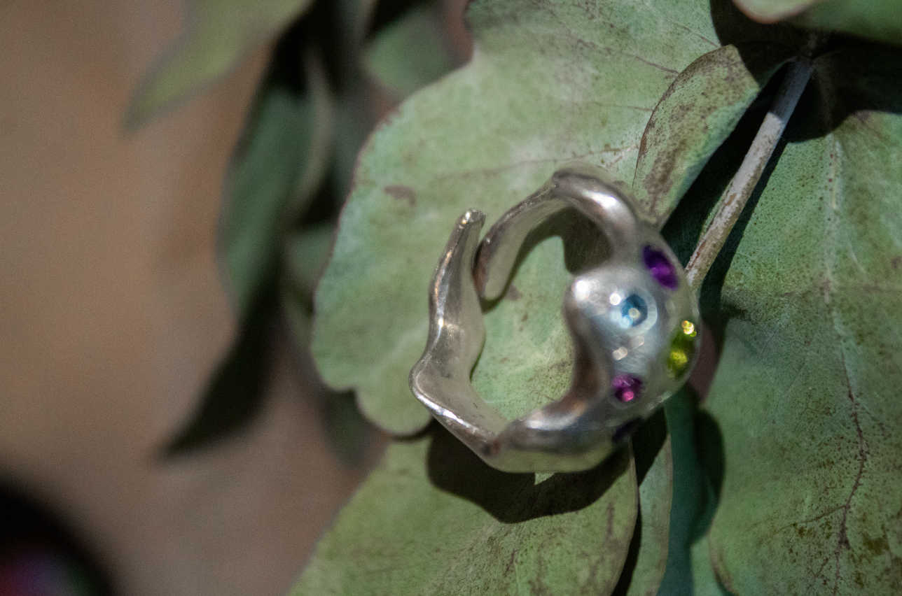 Transmute. Organic ring with gems